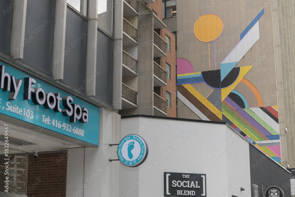 Fototapeta premium Healthy Foot Spa Massage and other buildings near 120 Eglinton Av E, Toronto