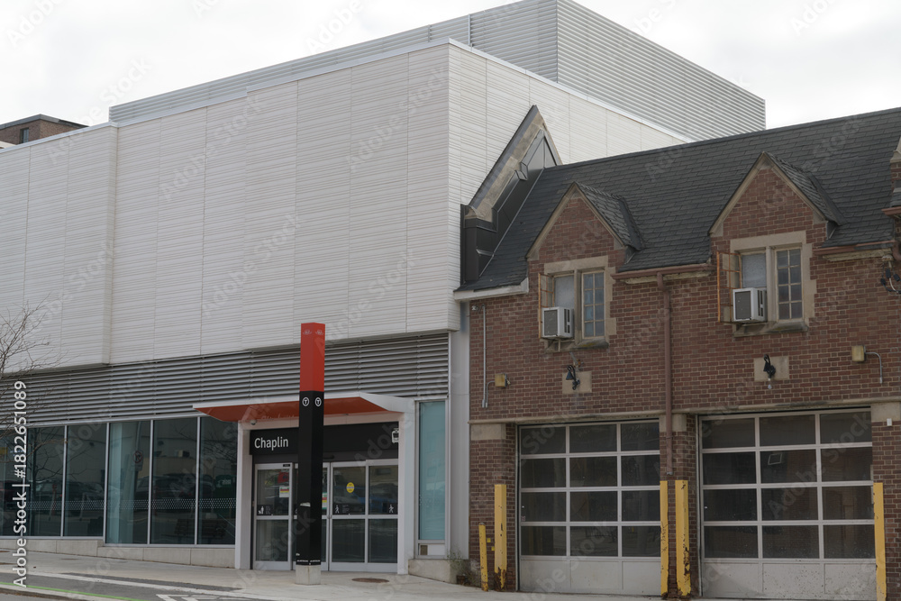 Fototapeta premium exterior of old building (fire hall) and Chaplin LRT Station located at 574 Eglinton Av W, Toronto
