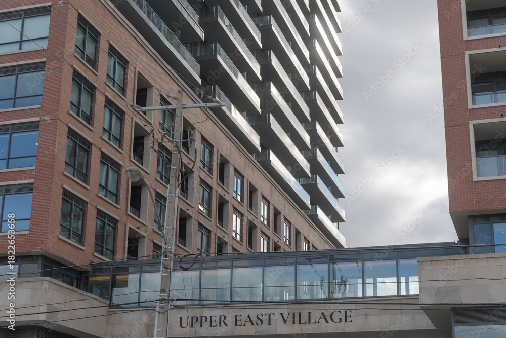 Fototapeta premium exterior and sign of Residences of Upper East Village located at 33 Frederick Todd Wy, Toronto (viewed from Eglinton Av E)