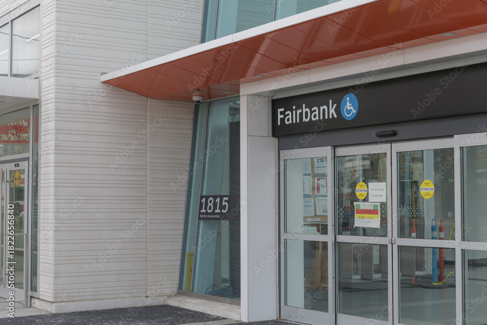 Fototapeta premium exterior building facade and sign of Fairbank LRT Station Second Entrance located at the northwest corner of Eglinton Av W and Dufferin St, Toronto