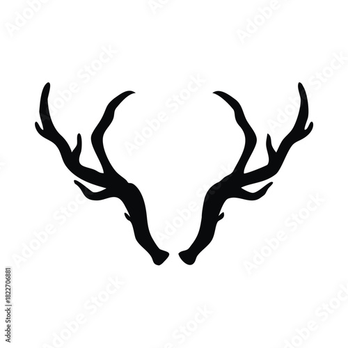 A symmetrical silhouette of deer antlers isolated on a white background