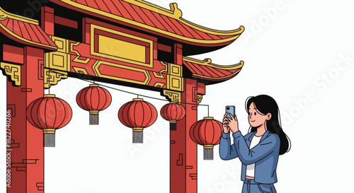 Woman capturing photos of traditional Chinese archway with lanterns.