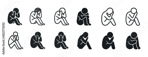 Silhouette icons of sitting individuals in various poses showing sadness and contemplation