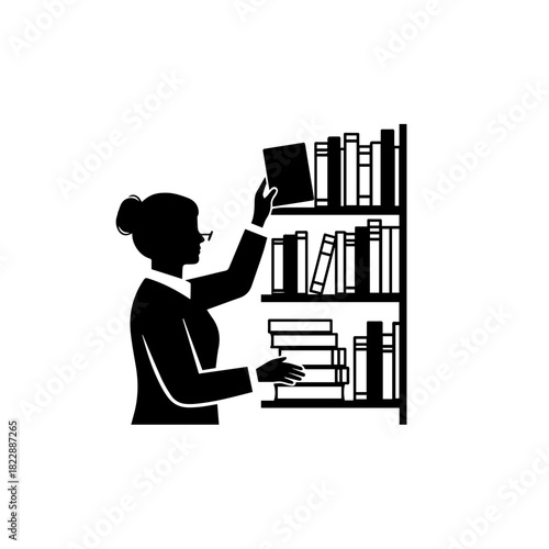 Woman selecting a book from a bookshelf