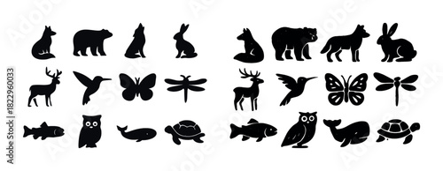 Silhouettes of diverse animals in black on white background
