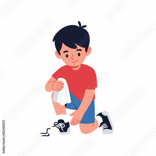 Cute cartoon boy kneeling down to tie his shoelaces.