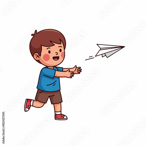Happy boy running and throwing paper airplane in the air.