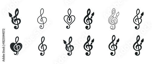 Creative treble clef designs with artistic brushes and hearts