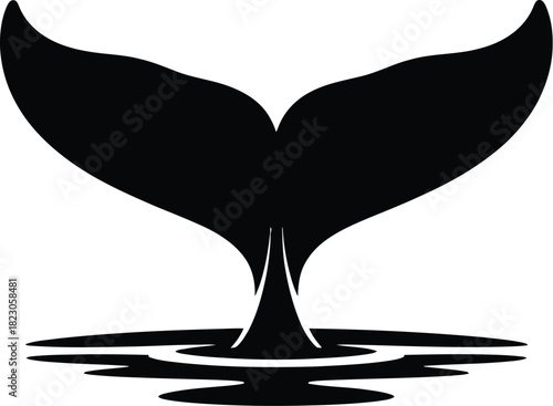 Black silhouette of a whale tail diving into water ripples