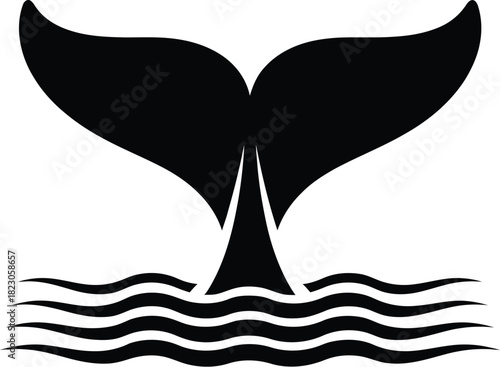 Black whale tail silhouette diving into waves fluke