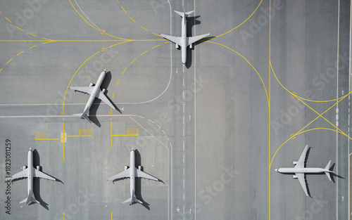 Foto Aerial View of Parked Airplane on Airport Runway