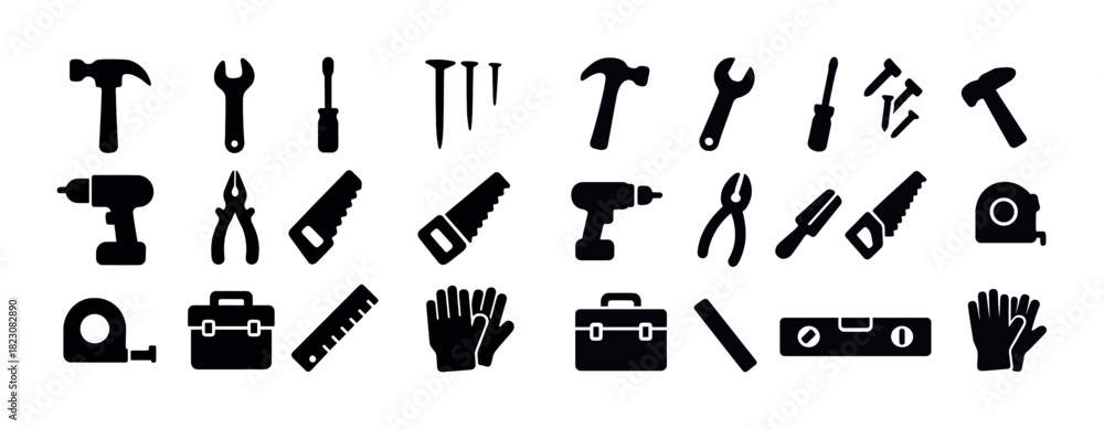 Obraz premium Collection of construction tool silhouettes: hammer, wrench, drill, saw, gloves, toolbox