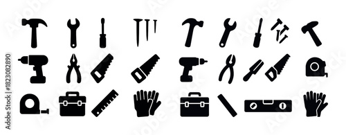 Collection of construction tool silhouettes: hammer, wrench, drill, saw, gloves, toolbox