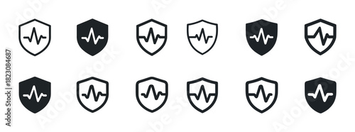 Set of heartbeat shield icons in black and white variations
