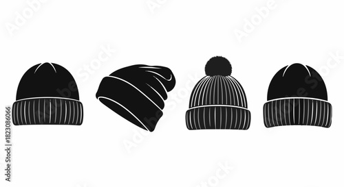 Four black beanie hats/winter caps in different styles, including one with a pom-pom, arranged horizontally on a white background.