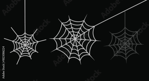 Three spiderwebs of varying sizes and shades of gray hang against a black background. Minimalist, cartoonish design.