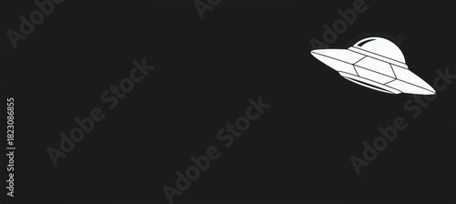 A simple black and white graphic of a UFO flying in a dark sky. The spaceship is white and features a classic saucer shape.