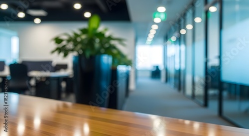 Wallpaper Mural Blurred modern office interior with plant and wooden table Torontodigital.ca