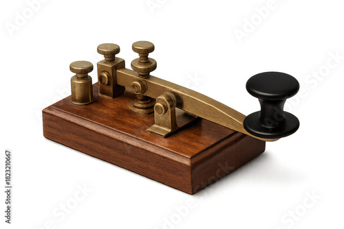 Antique brass telegraph key on a wooden base for morse code communication history.