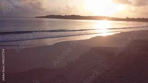 4k 30 fps sunrise in the caribbean beach in the mornig with drone 1