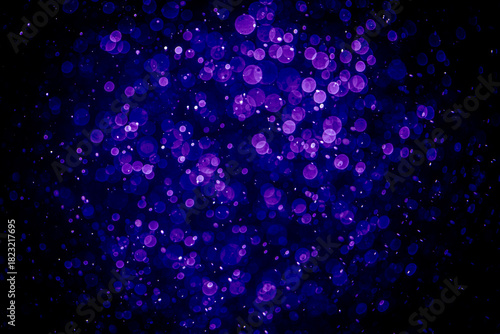 Blurred photo with purple violet and blue dots visible glittering, shining brightly look and feel luxurious