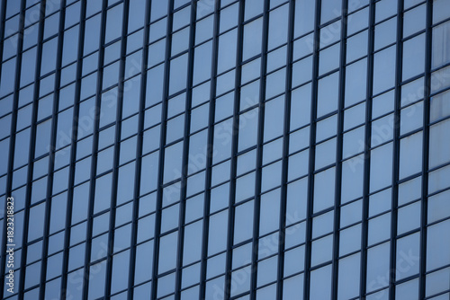 Wallpaper Mural A section of a modern building with many rectangular glass windows reflecting the clear Torontodigital.ca