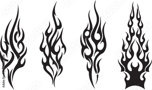 Four distinct black tribal flame tattoo designs, each featuring unique swirling patterns and sharp edges, creating a dynamic and powerful aesthetic