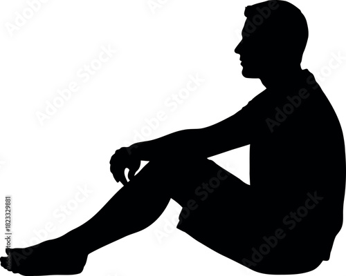 Male silhouette sitting relaxed profile view, isolated figure