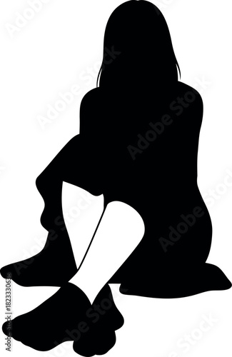 Silhouette of a woman sitting down, reflecting on thoughts or feelings