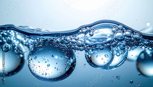 Dynamic macro background of refreshing clean water with blue air bubble and oxygen. pure concept for purification technologies and environmental science innovation