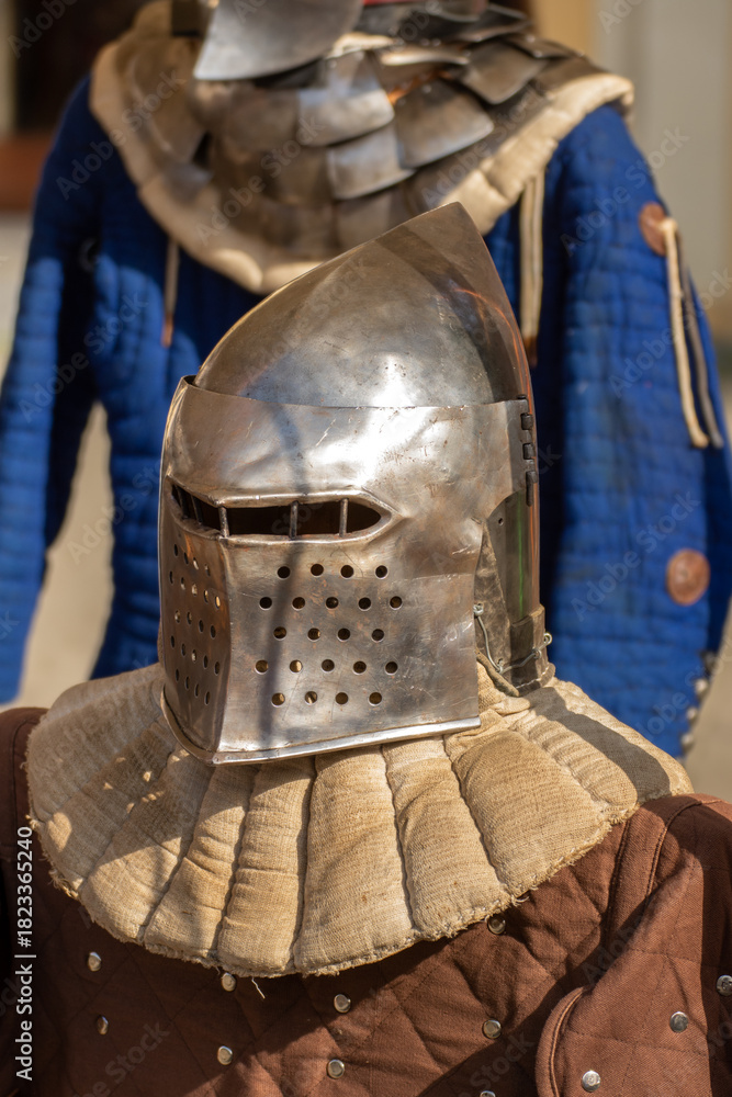 Obraz premium old medieval bascinet-type helmet popular in medieval Europe, evolving from a simple steel cap in the late 13th century