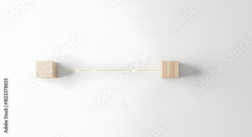 Fototapeta Naklejka Na Ścianę i Meble -  3D rendering of two wooden cubes connected by a thin glowing golden line on white background