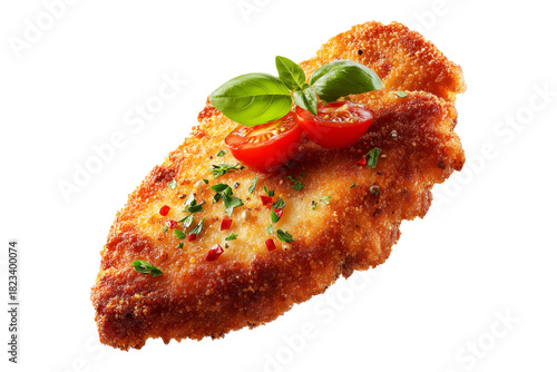 Milanesa breaded beef chicken schnitzel or cutlet with fresh tomato wedge, isolated on white transparent background, concept of South American Cuisine