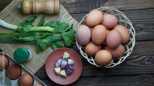eggs in a basket on wooden table