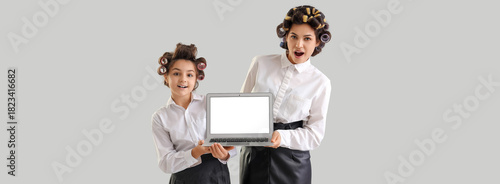 Businesswoman and her littl...
