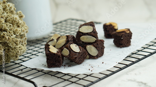 selective focus pieces of fresh brownie on white background. Delicious chocolate pie