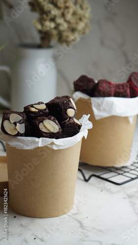 selective focus brownies bites on cup, white background