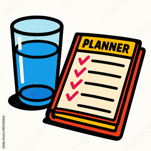 Glass of water beside planner