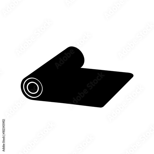 Black yoga mat unrolled with a rolled up section in minimalist style