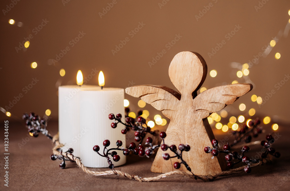 Obraz premium Advent white candles with decor in shiny lights closeup