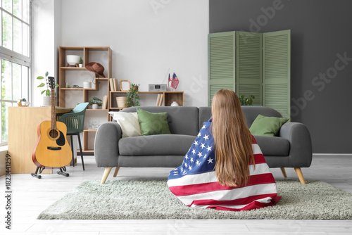 Young woman with USA flag s...