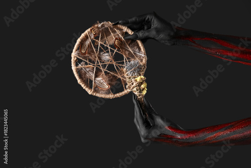 Bloody witch hands with cla...