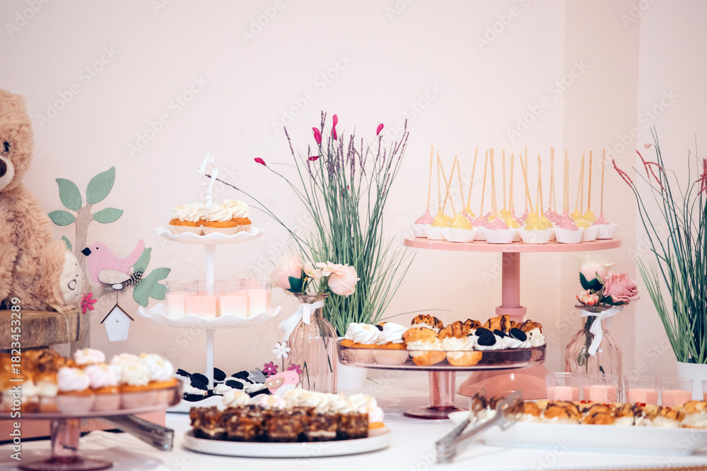 Naklejka premium Candy bar of different cookies, candy and sweets at party