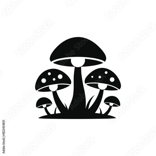 Black silhouette of a cluster of mushrooms isolated on white background