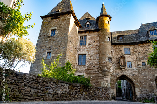 Fototapeta Naklejka Na Ścianę i Meble -  Walking in Uzerche, historical fortified royal patronage medieval town in Correse department, Nouvelle-Aquitaine, France, old houses and narrow streets