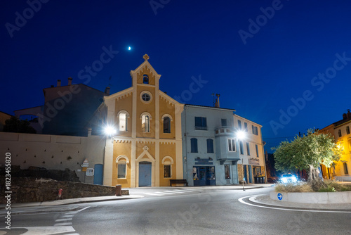 Fototapeta Naklejka Na Ścianę i Meble -  Panoramic view of colourful Collioure at night, narrow streets and yellow, pink, orange houses, historical buidings and beaches, Pyrenees-Orientales, France