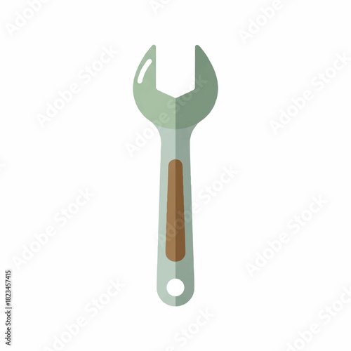 A light green wrench with a brown grip and a hole