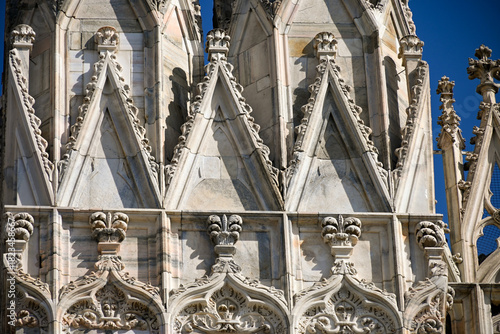 Fototapeta Naklejka Na Ścianę i Meble -  Views of central part of Milan, Brera district, shopping area, church Duomo, architectural details, streets, walking in Milan, Lombardy, Italy