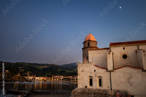 Fototapeta Naklejka Na Ścianę i Meble -  Morning view of colourful Collioure, narrow streets and yellow, pink, orange houses, summer vacation destination town with historical buidings and beaches, Pyrenees-Orientales, France