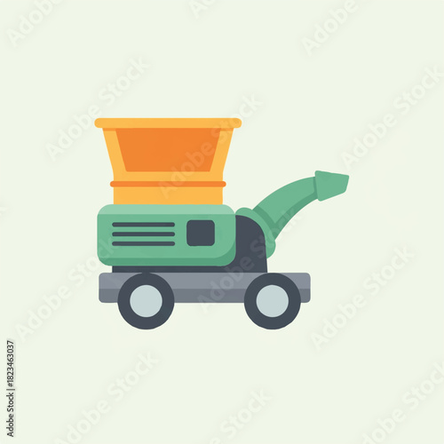Green and orange wood chipper on wheels
